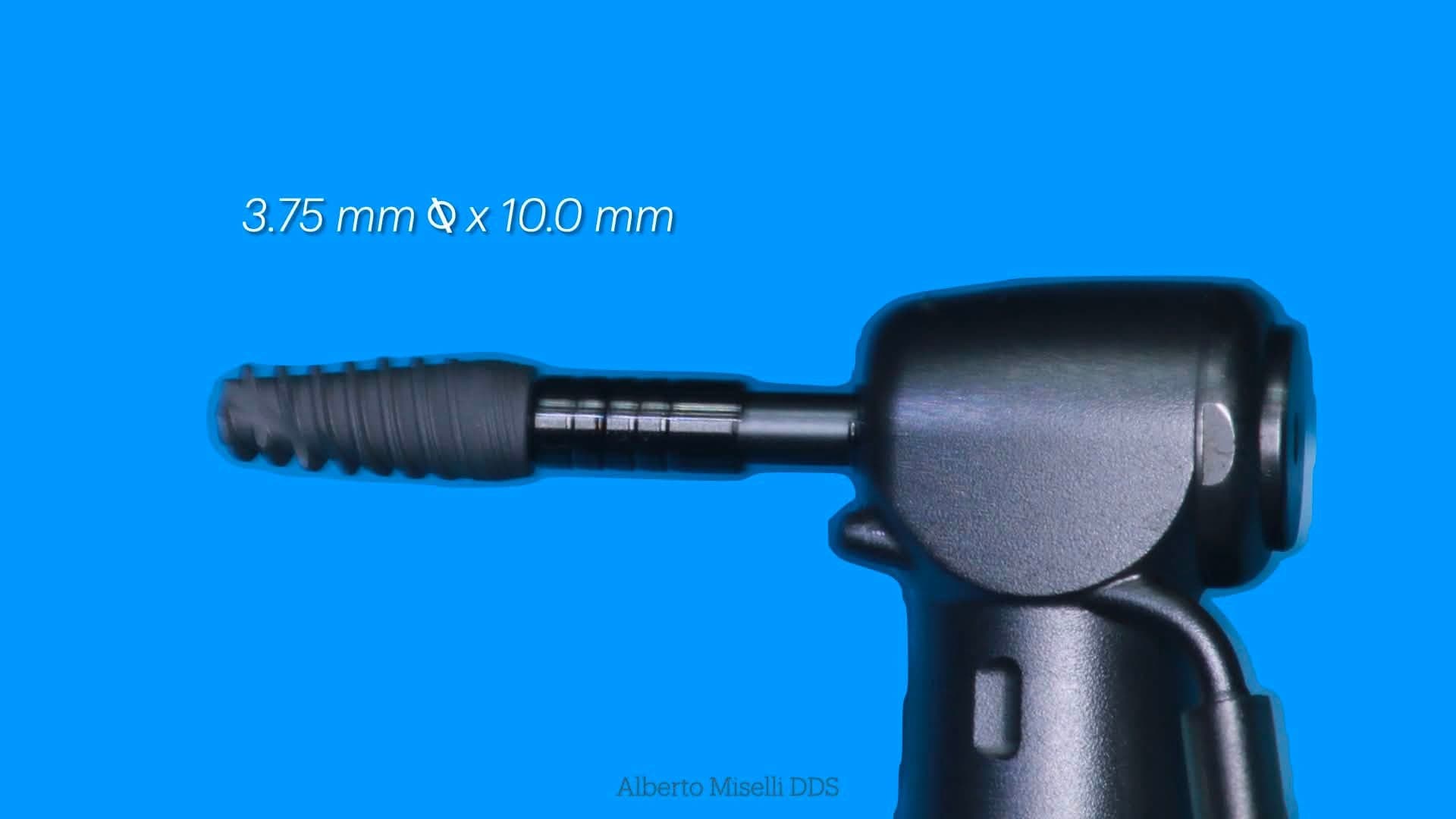 Close-up of the 3.75 x 10.0 mm implant mounted on the delivery driver against a blue photographic backdrop